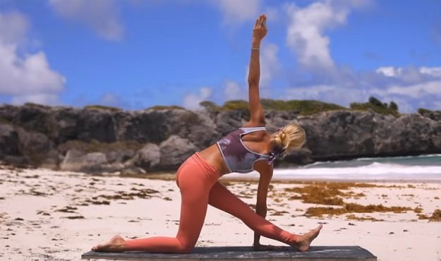 Athletic yoga stretch for flexibility class video